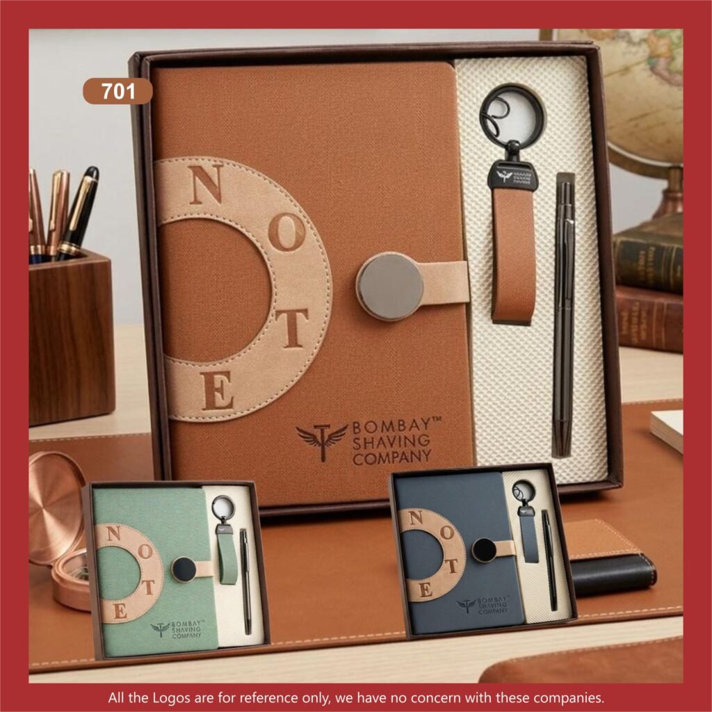 Premium notebook, keychain and pen gift set in a stylish presentation box, featuring a brown notebook with a matching keychain and sleek metal pen.