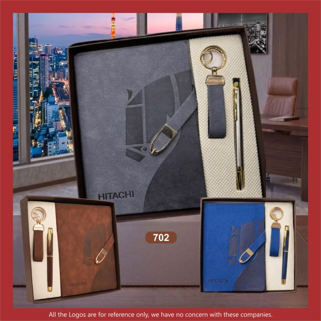 Premium notebook, keychain and pen gift set in a stylish presentation box, featuring a brown notebook with a matching keychain and sleek metal pen.